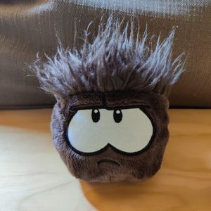 brown puffle plush
